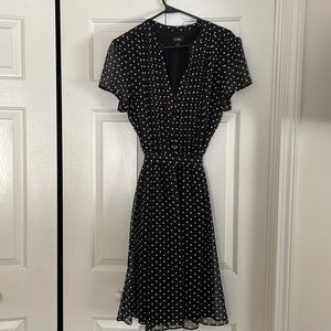Black and white polka dot knee length dress